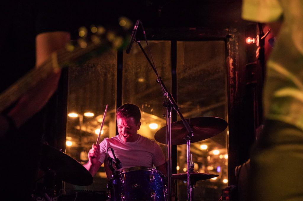 Image of Seve playing drums at Market Hotel